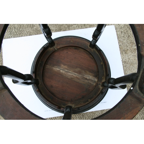 847 - A Chinese hardwood circular table, possibly Zitan, 57cms diameter.