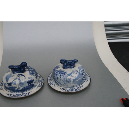 816 - A large pair of Chinese blue & white vases and covers decorated with figures and with fo dog finials... 