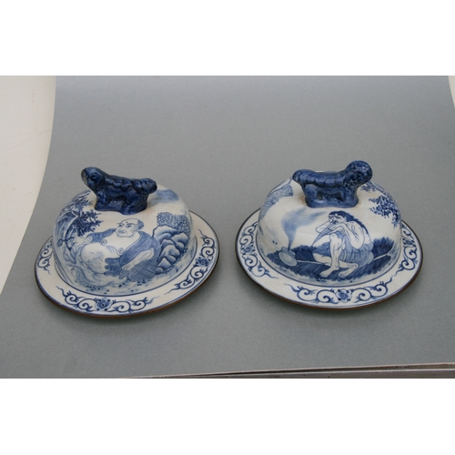 816 - A large pair of Chinese blue & white vases and covers decorated with figures and with fo dog finials... 