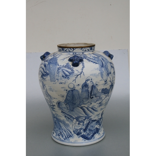 816 - A large pair of Chinese blue & white vases and covers decorated with figures and with fo dog finials... 