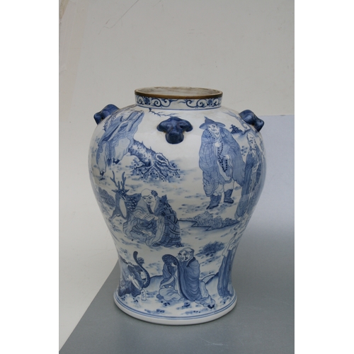 816 - A large pair of Chinese blue & white vases and covers decorated with figures and with fo dog finials... 