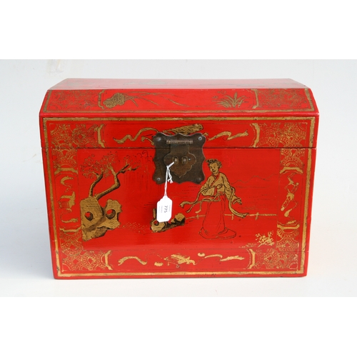 775 - A Chinese red lacquer box and cover decorated with gilt figures within a landscape, 45cms wide.