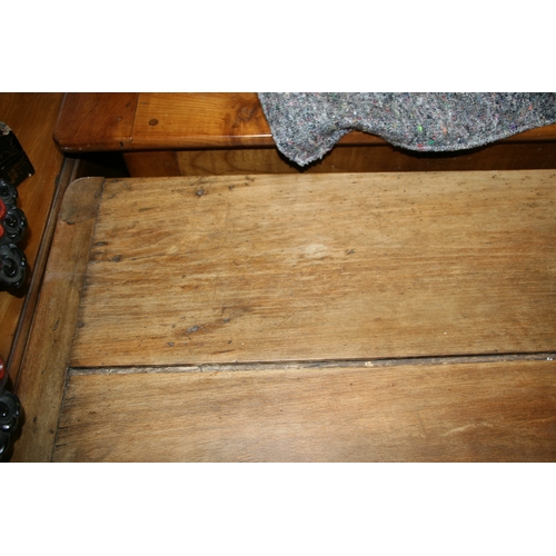 898 - A continental fruitwood farmhouse table with three plank top, single frieze drawer and turned legs, ... 