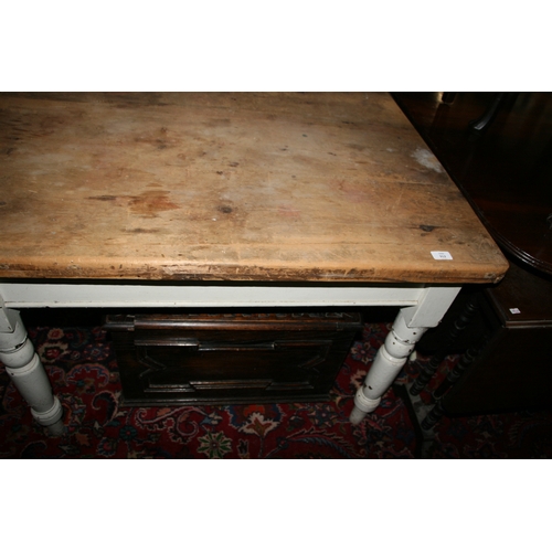 912 - A Victorian pine kitchen table with scrubbed top and single frieze drawer, 104cms wide.