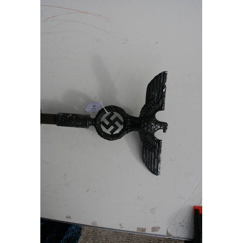 75 - A WWII German Third Reich style cast metal insignia, 25cms wide, mounted on a metal spike (believed ... 