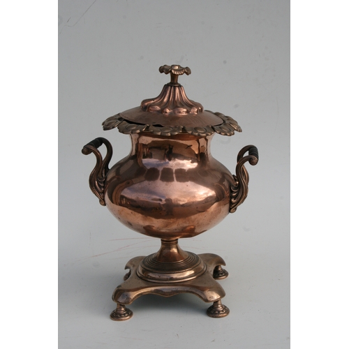 560 - A copper and brass samovar, 30cms wide.