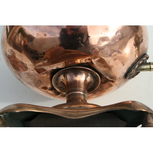 560 - A copper and brass samovar, 30cms wide.