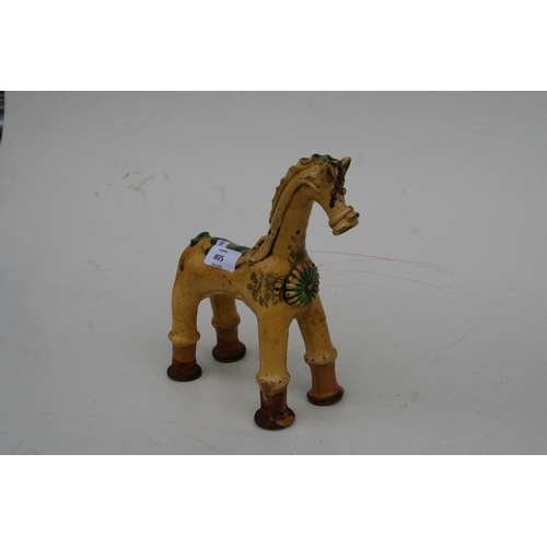 805 - A Turkish Canakkale pottery figure of a stylised horse, 24cms high.