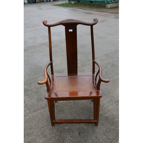 850 - A Chinese hardwood 'Official's Hat' chair with rattan seat.