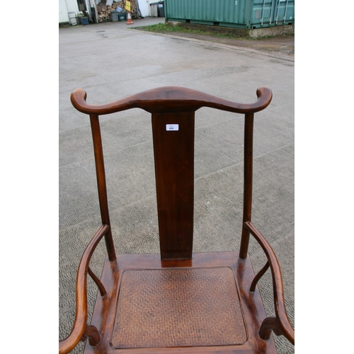 850 - A Chinese hardwood 'Official's Hat' chair with rattan seat.