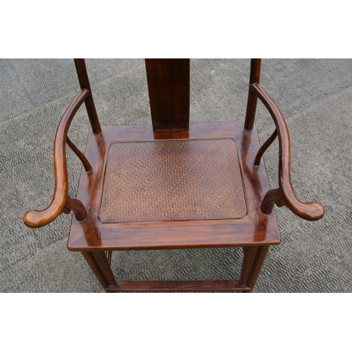 850 - A Chinese hardwood 'Official's Hat' chair with rattan seat.