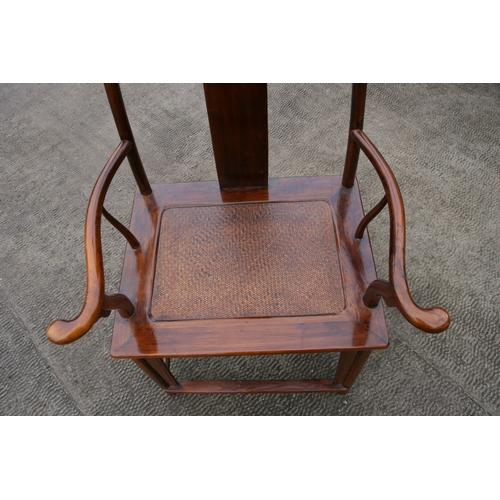 850 - A Chinese hardwood 'Official's Hat' chair with rattan seat.