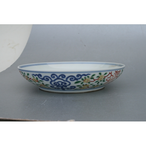 845 - A Chinese Ducai shallow footed bowl, blue six character mark to the underside, 21cms diameter.