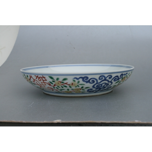 845 - A Chinese Ducai shallow footed bowl, blue six character mark to the underside, 21cms diameter.