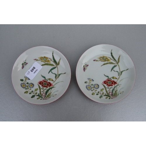 849 - A pair of Chinese dishes decorated with flowers and a butterfly in enamel colours, the exterior with... 