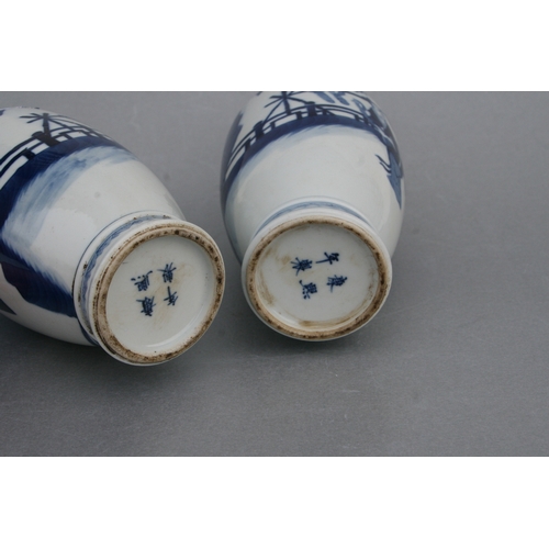 836 - A pair of Chinese blue & white baluster vases decorated with figures in a garden, blue four characte... 