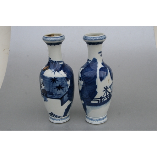 836 - A pair of Chinese blue & white baluster vases decorated with figures in a garden, blue four characte... 