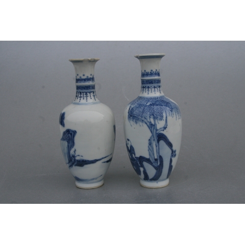 836 - A pair of Chinese blue & white baluster vases decorated with figures in a garden, blue four characte... 