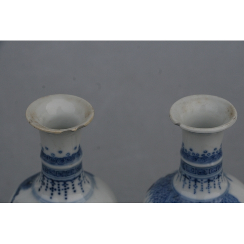 836 - A pair of Chinese blue & white baluster vases decorated with figures in a garden, blue four characte... 