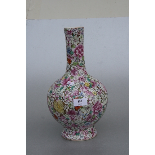 839 - A Chinese millefiori bottle vase with red seal mark to the underside, 33cms high.