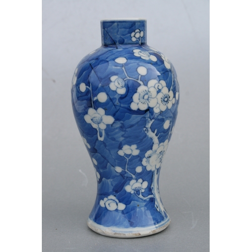 797 - A Chinese blue & white baluster vase decorated with prunus on a cracked ice ground, four character b... 