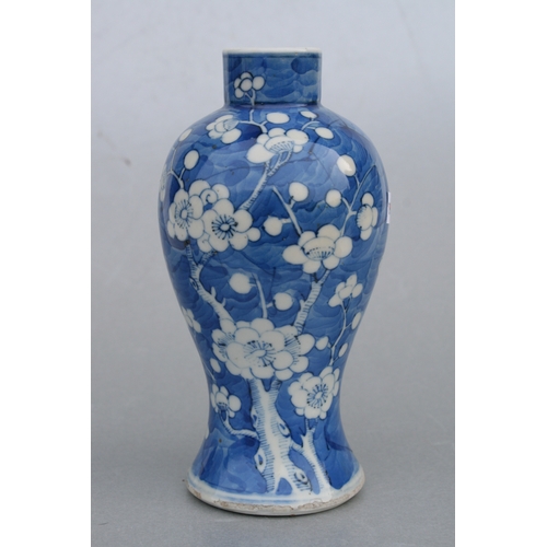 797 - A Chinese blue & white baluster vase decorated with prunus on a cracked ice ground, four character b... 