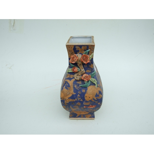 726 - A Chinese famille rose baluster vase decorated with figures within panels and foliate scrolls, on a ... 