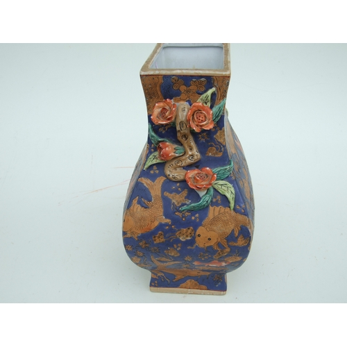 726 - A Chinese famille rose baluster vase decorated with figures within panels and foliate scrolls, on a ... 