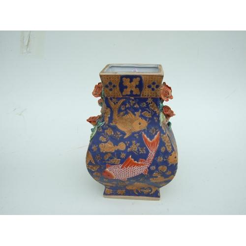 726 - A Chinese famille rose baluster vase decorated with figures within panels and foliate scrolls, on a ... 