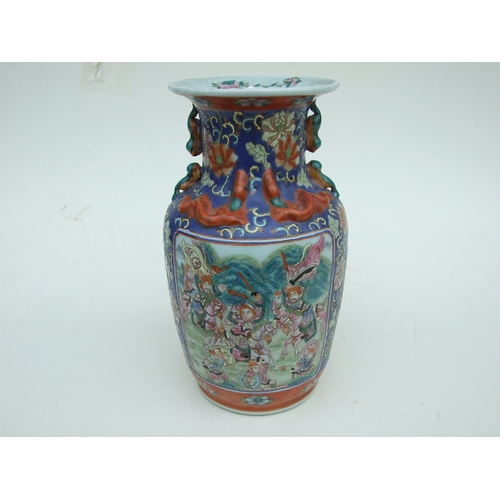 726 - A Chinese famille rose baluster vase decorated with figures within panels and foliate scrolls, on a ... 