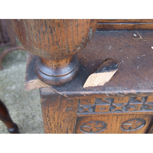 1019 - A 17th century style carved oak court cupboard of small proportions, 70cms wide.