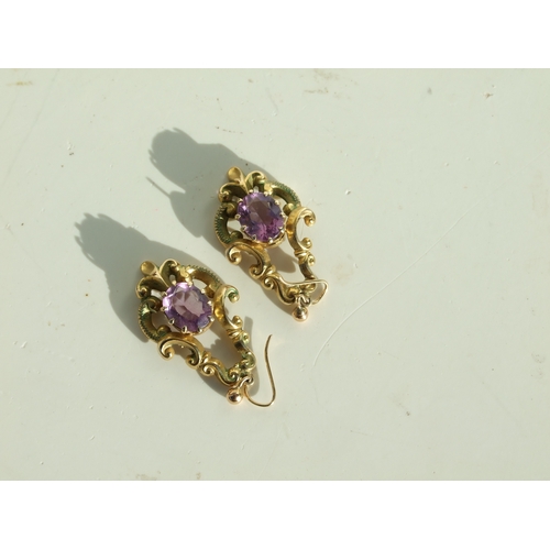 709 - A pair of Victorian 9ct gold amethyst set drop earrings, 3cms high, total weight 9.3g, fitted in a l... 