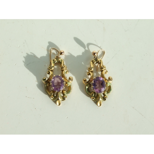 709 - A pair of Victorian 9ct gold amethyst set drop earrings, 3cms high, total weight 9.3g, fitted in a l... 