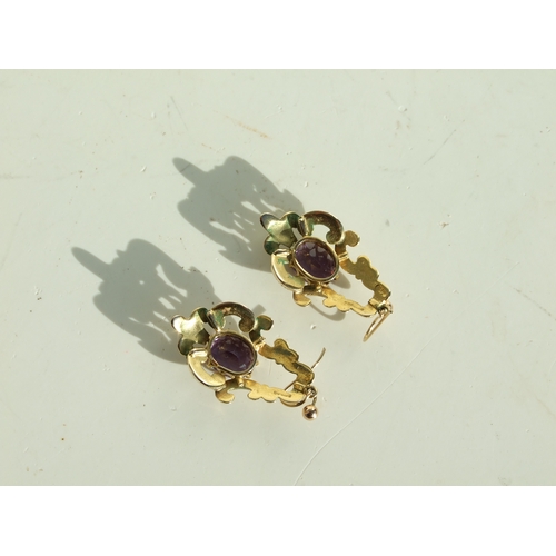 709 - A pair of Victorian 9ct gold amethyst set drop earrings, 3cms high, total weight 9.3g, fitted in a l... 