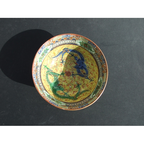 730 - A Chinese famille rose dish decorated with chickens, 14cms diameter; together with a similar bowl de... 