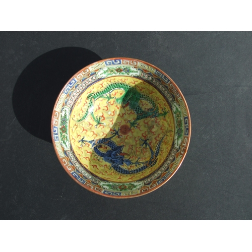 730 - A Chinese famille rose dish decorated with chickens, 14cms diameter; together with a similar bowl de... 