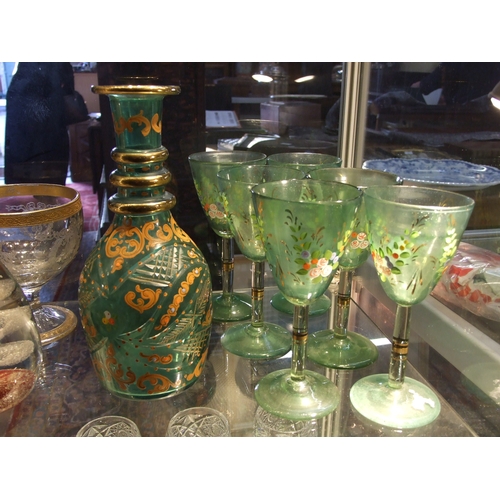 103 - A 19th century Bohemian suite of glass for the Ottoman market, a decanter and stopper with six goble... 