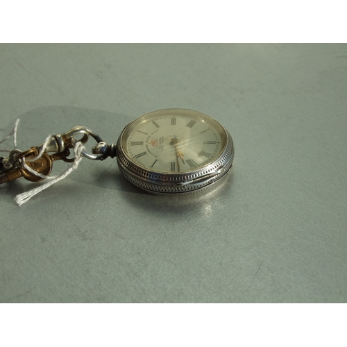 595 - A silver cased open faced fob watch on an Albert chain.