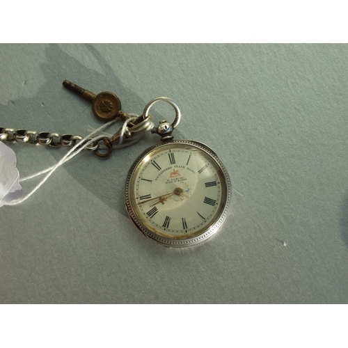 595 - A silver cased open faced fob watch on an Albert chain.