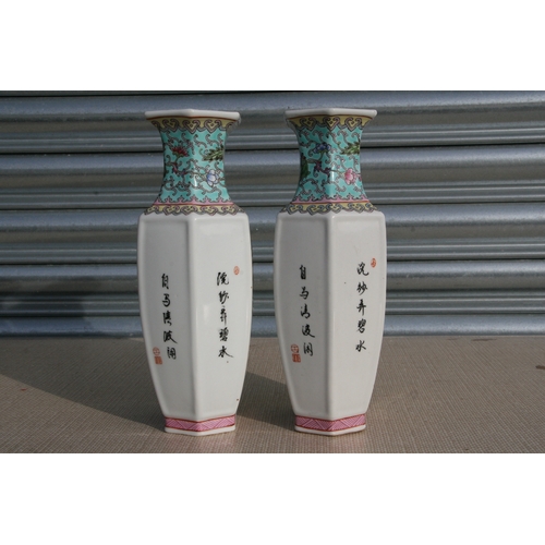 796 - A pair of Chinese Republic style vases decorated with figures and calligraphy, red seal mark to the ... 