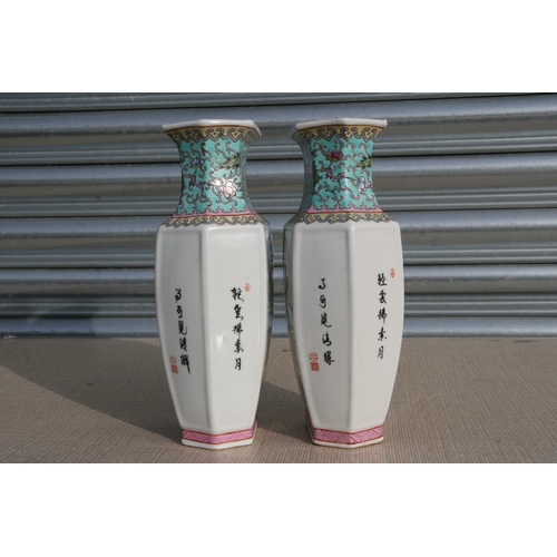 796 - A pair of Chinese Republic style vases decorated with figures and calligraphy, red seal mark to the ... 