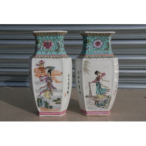 796 - A pair of Chinese Republic style vases decorated with figures and calligraphy, red seal mark to the ... 