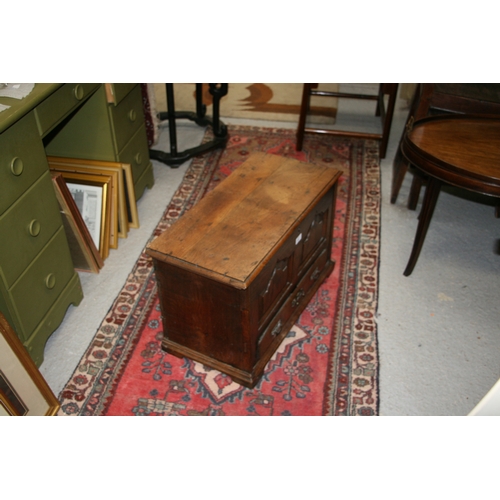 995 - A George II Welsh oak coffer bach, the boarded hinged lid with a moulded edge revealing a vacant int... 