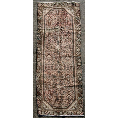 108 - A Persian Hamadan woollen hand knotted runner, 300 by 100cms (375).