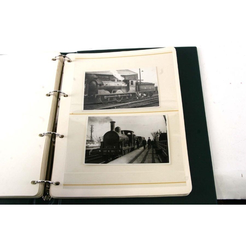 20 - Railway interest:  An album of real photographic postcards depicting locomotives and railway scenes ... 