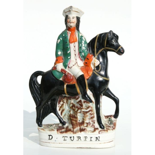 245 - A Victorian Staffordshire flatback figure in the form of Dick Turpin, 25cms high.