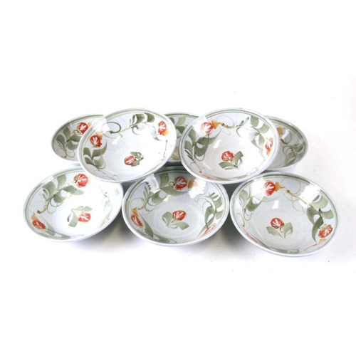 254 - A set of eight Aldermaston Studio pottery bowls decorated with fruit, 17cms diameter (8).