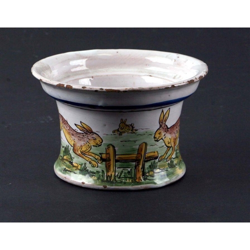 277 - A Faience tin glazed earthenware bowl decorated with rabbits and inscription 'Charcuterie Chagnaud A... 