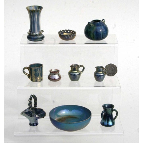 289 - A quantity of Rye Pottery miniature lustre wares to include vases and jugs.