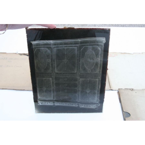 302 - A large quantity of glass photographic plates depicting antique furniture, possibly for an early auc... 